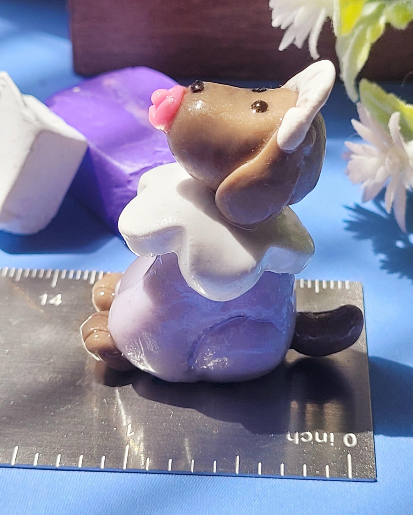 the puppy miniature measures 1.2 inches x 1.5 inches or 3.05cm x 3.81cm