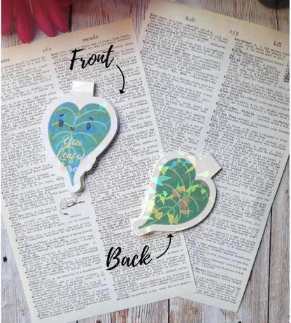 Front and back of plant leaf bookmark.